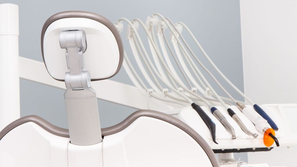 3 clinics in Algeria to research showing a modern dental chair and instruments in a clinic setting.