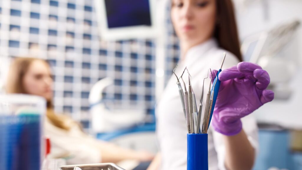 Dental tools ready for re-bonding when a veneer fell off
