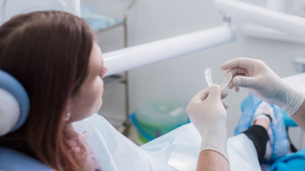 Do veneers hurt during the temporary phase? Dentist explains temporary veneers to patient